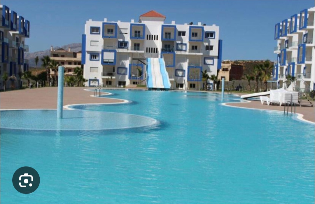 Vue Piscine et Mer Exceptionnelle & Toboggans Aquatiques – Bel Appartement avec Ascenseur (Kariat Cabo) — photo
