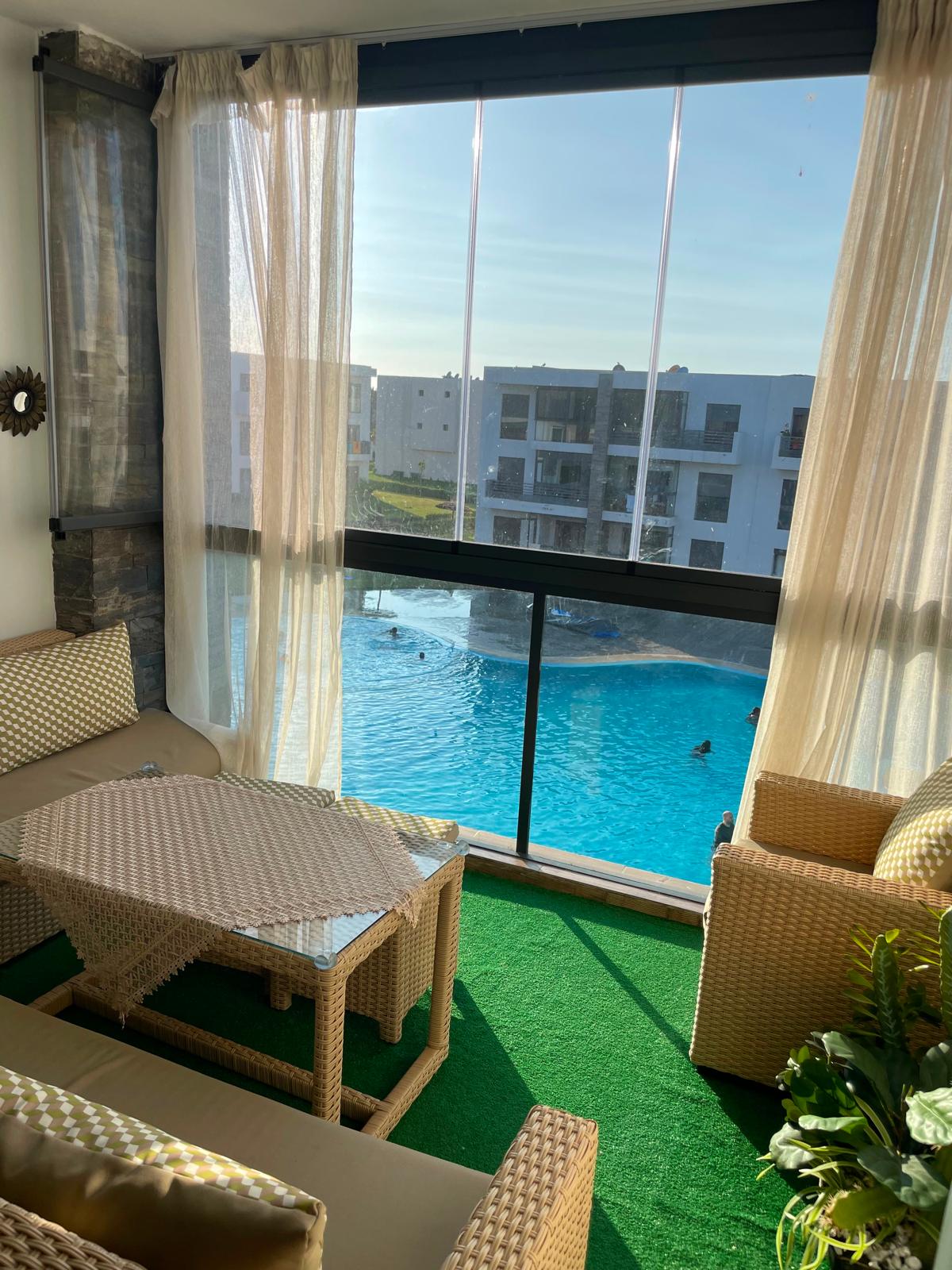 Appartement de Standing– Résidence Bleu Dalia (Proche Ola Blanca), Vue Piscine & Toboggans, Plage à 5 min à Pied — Sidi Rahal, Maroc