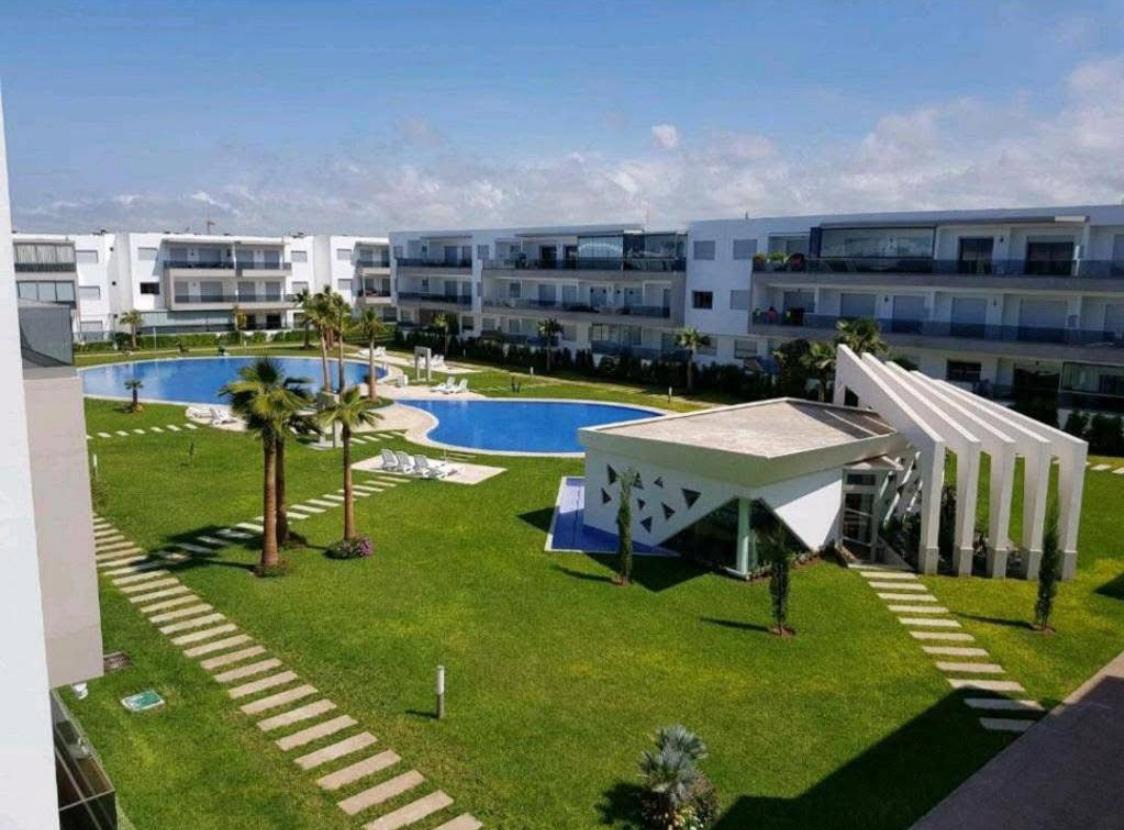 Escale d'Exception Pieds dans l'Eau : Accès direct plage & Piscines à Blanca Beach — photo