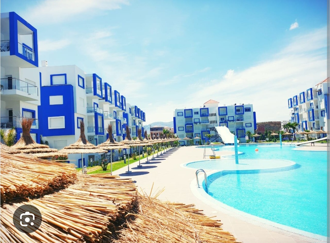 Vue Piscine et Mer Exceptionnelle & Toboggans Aquatiques – Bel Appartement avec Ascenseur (Kariat Cabo) — photo